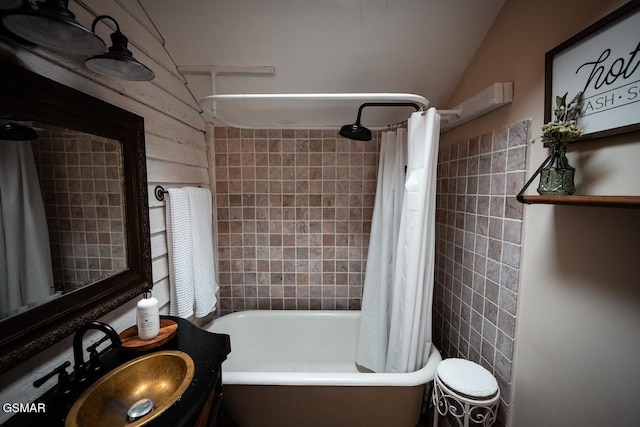 bathroom with vanity and shower / bath combo with shower curtain