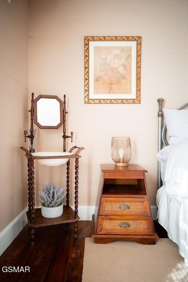 bedroom featuring wood-type flooring