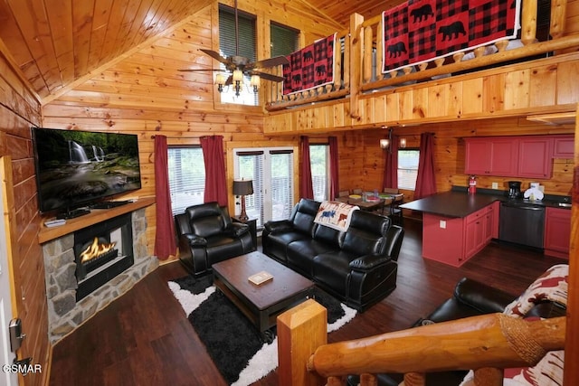 living room featuring wooden ceiling, wooden walls, a fireplace, and dark wood finished floors