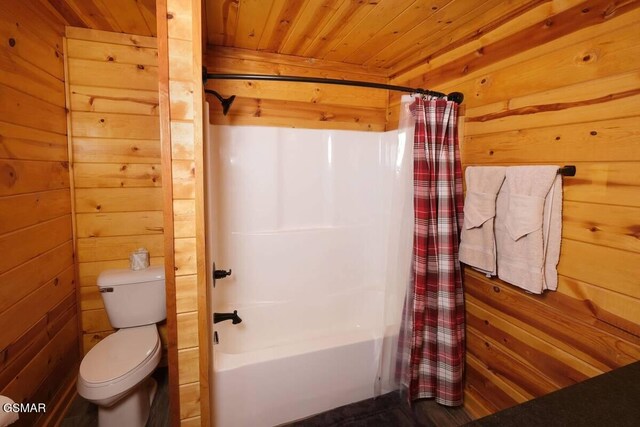 bathroom with wooden ceiling, wooden walls, toilet, and shower / bath combo with shower curtain