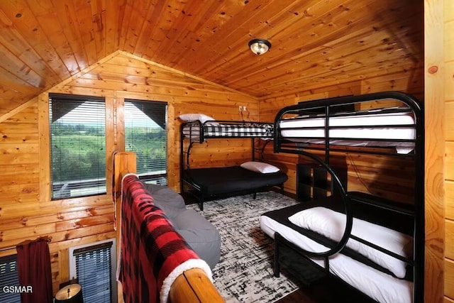 bedroom featuring lofted ceiling, wooden ceiling, wooden walls, and heating unit