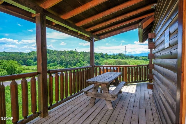 deck with a wooded view