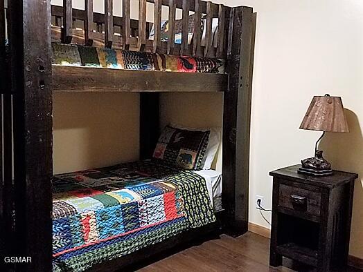 bedroom featuring hardwood / wood-style floors