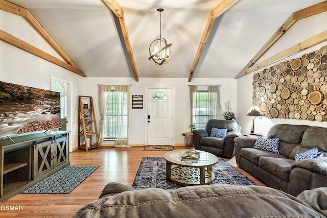 3230 Cove Creek Way, Sevierville, TN 37862 - living area with wood finished floors, a chandelier, beamed ceiling, high vaulted ceiling, and baseboards