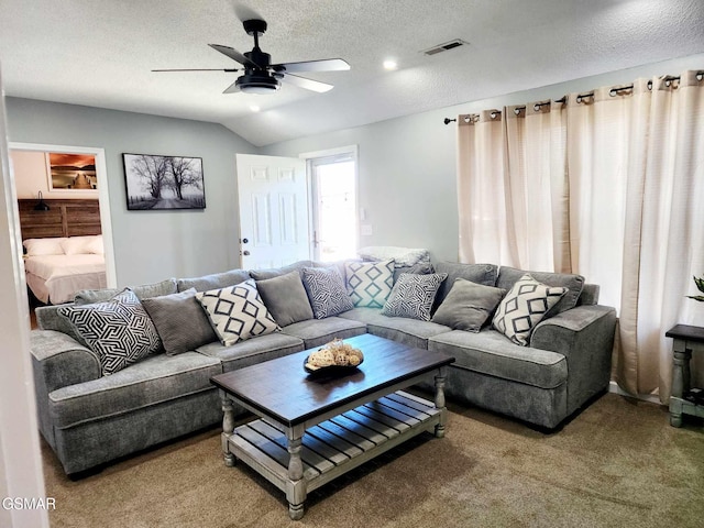 2904 Boyds Creek Hwy Unit 4, Sevierville, TN 37876 - carpeted living room with a ceiling fan, vaulted ceiling, and a textured ceiling