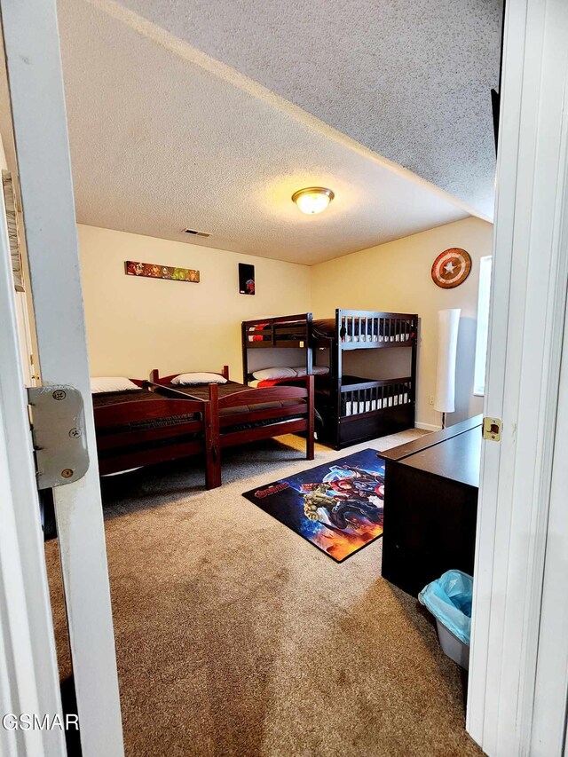 2904 Boyds Creek Hwy Unit 4, Sevierville, TN 37876 - bedroom with carpet and a textured ceiling