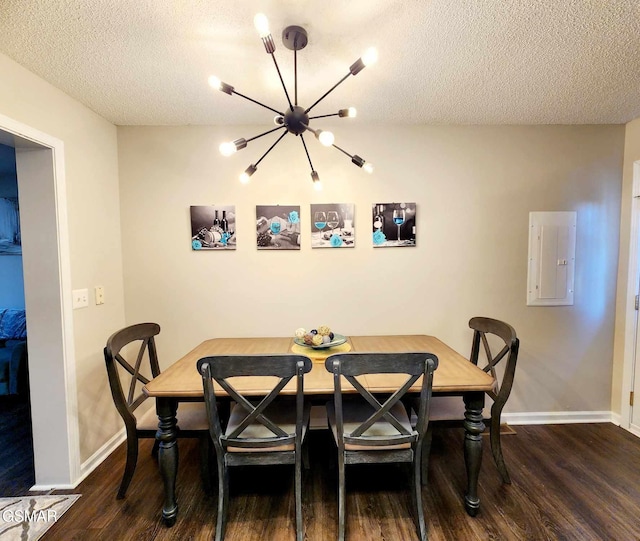 2904 Boyds Creek Hwy Unit 4, Sevierville, TN 37876 - dining room featuring a chandelier, dark wood finished floors, a textured ceiling, and electric panel