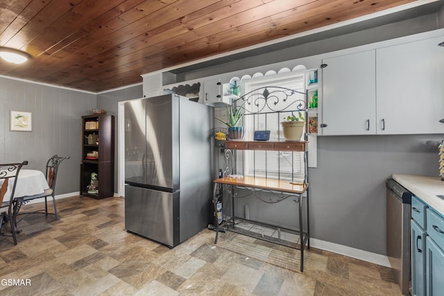 kitchen with stainless steel appliances, baseboards, wood ceiling, and light countertops