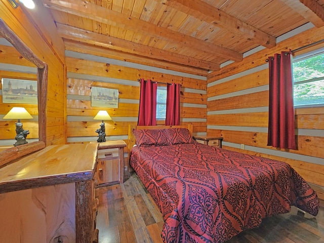 bedroom with wood walls, beamed ceiling, wooden ceiling, and dark hardwood / wood-style floors