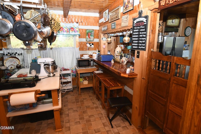 miscellaneous room with wood ceiling