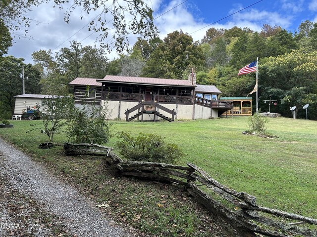 view of yard featuring a wooden deck