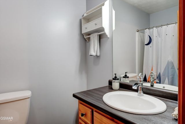 1001 Sunrise Blvd, Sevierville, TN 37862 - bathroom featuring toilet, a shower with curtain, and vanity