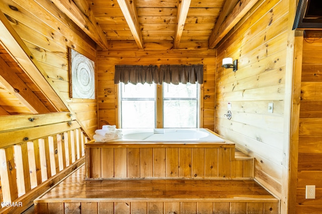 817 Eagle Cove Way, Gatlinburg, TN 37738 - staircase with wooden walls, a wooden ceiling with exposed beams, and hardwood / wood-style floors