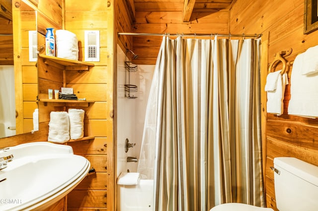 817 Eagle Cove Way, Gatlinburg, TN 37738 - bathroom featuring wood walls and a shower with curtain