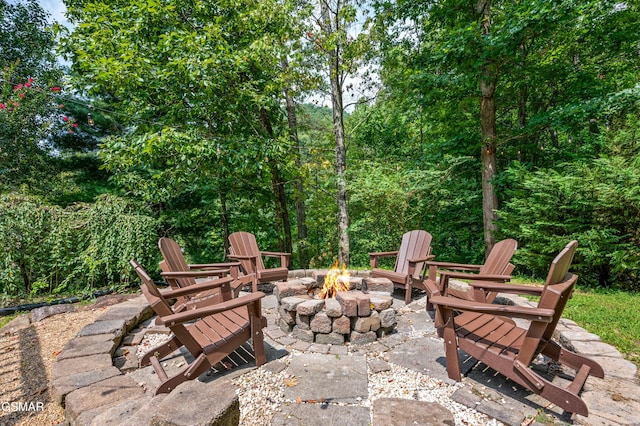 view of patio / terrace featuring a fire pit