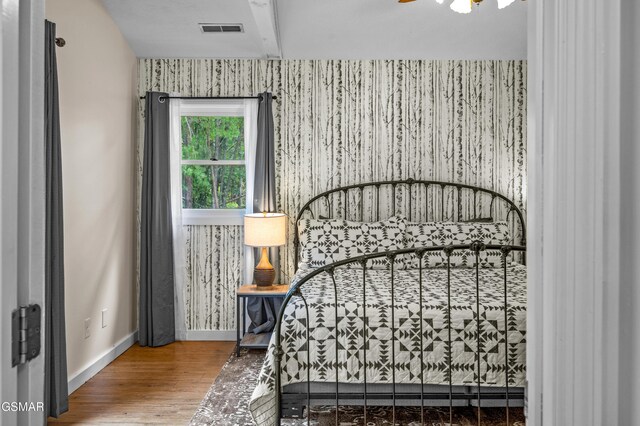 bedroom featuring hardwood / wood-style floors