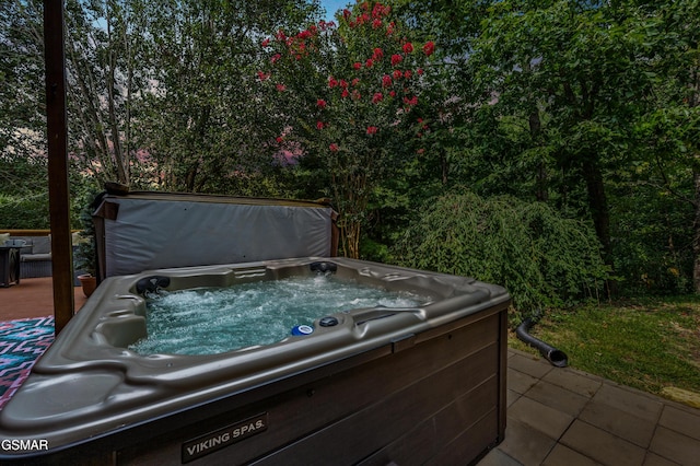 view of patio / terrace featuring a hot tub