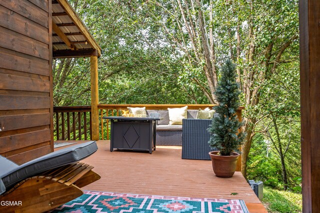 deck with an outdoor living space