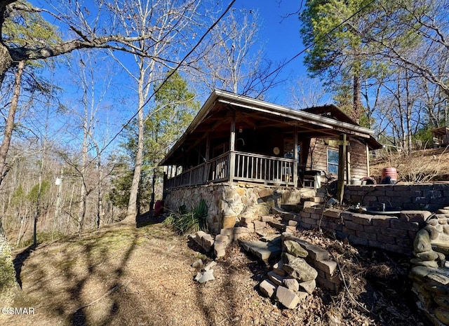 view of home's exterior featuring covered porch