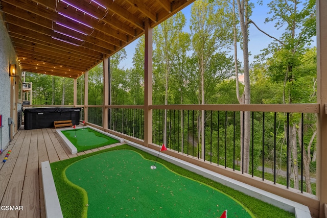 1924 Pine Ct, Sevierville, TN 37876 - wooden terrace with an area to practice putting and a hot tub