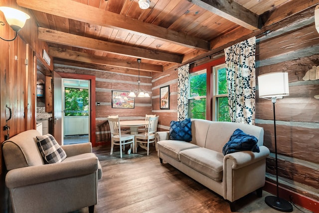 living room with beam ceiling, hardwood / wood-style flooring, wooden ceiling, and wood walls