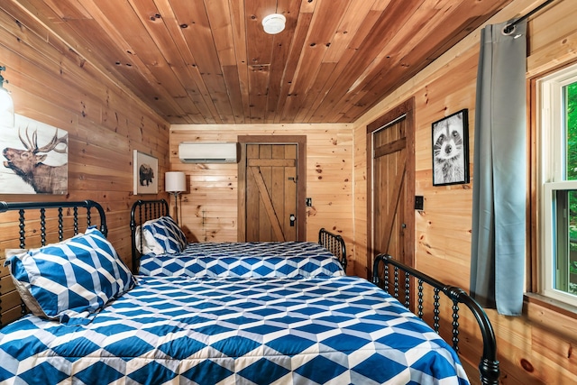 bedroom featuring a wall mounted AC, wood walls, and wood ceiling