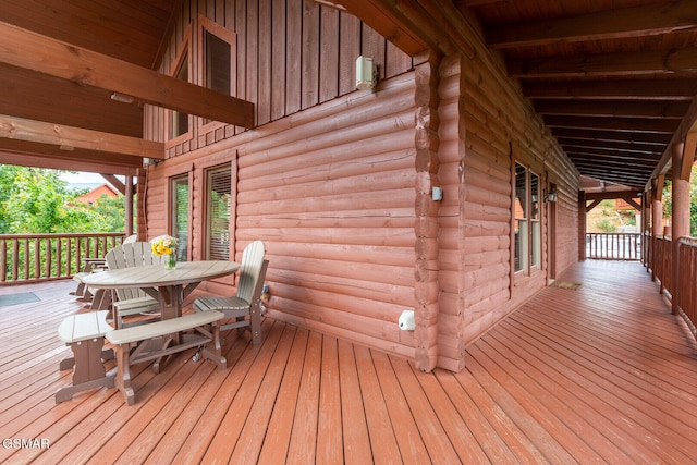 wooden terrace featuring a porch