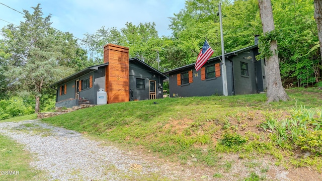 1920 Inskip Ln, Dandridge, TN 37725 - view of property exterior with a chimney