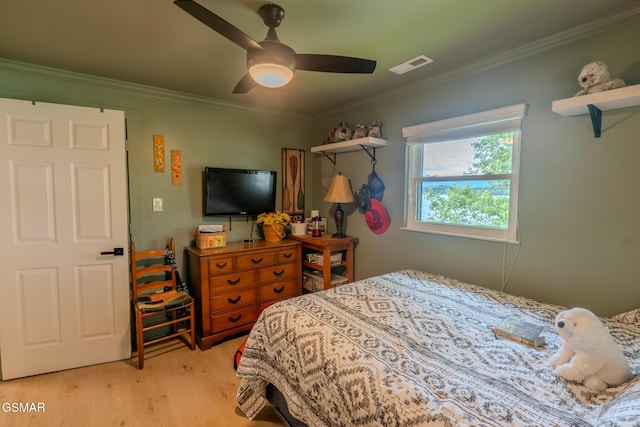 1920 Inskip Ln, Dandridge, TN 37725 - bedroom with light wood finished floors, crown molding, and a ceiling fan
