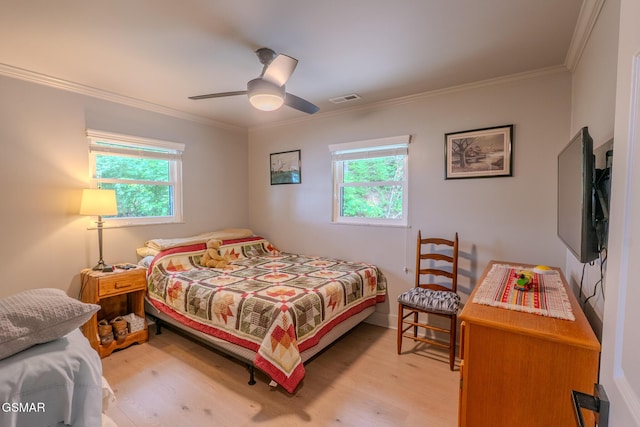 1920 Inskip Ln, Dandridge, TN 37725 - bedroom with light wood-style flooring, multiple windows, ornamental molding, and ceiling fan