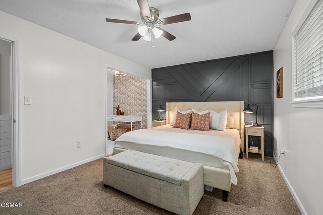 bedroom with ceiling fan and carpet floors