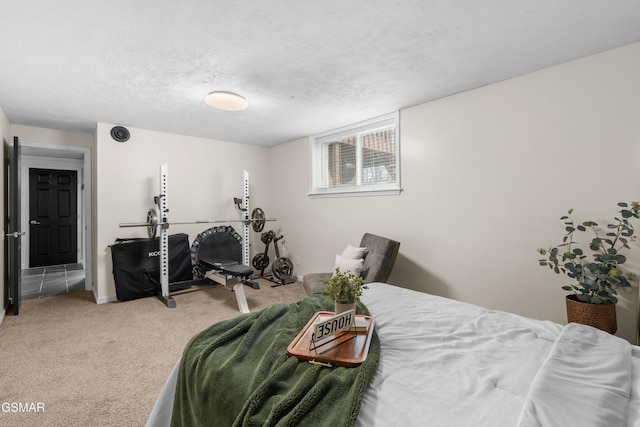 carpeted bedroom with a textured ceiling