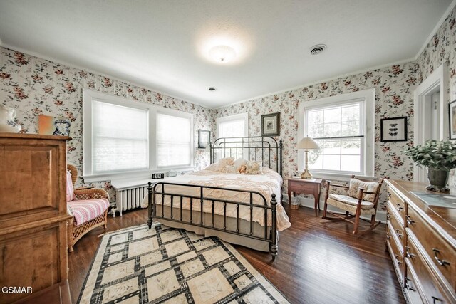 294 Clifton Heights Rd, Newport, TN 37821 - bedroom featuring wallpapered walls, visible vents, and dark wood-type flooring