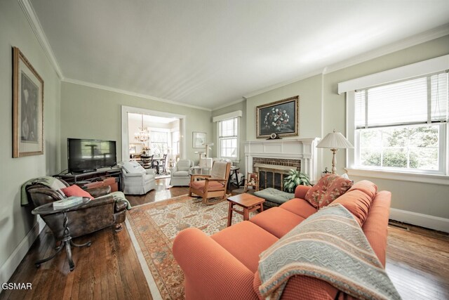 294 Clifton Heights Rd, Newport, TN 37821 - living room featuring baseboards, ornamental molding, and wood-type flooring