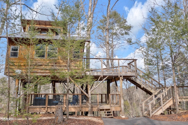 view of home's community with a wooden deck