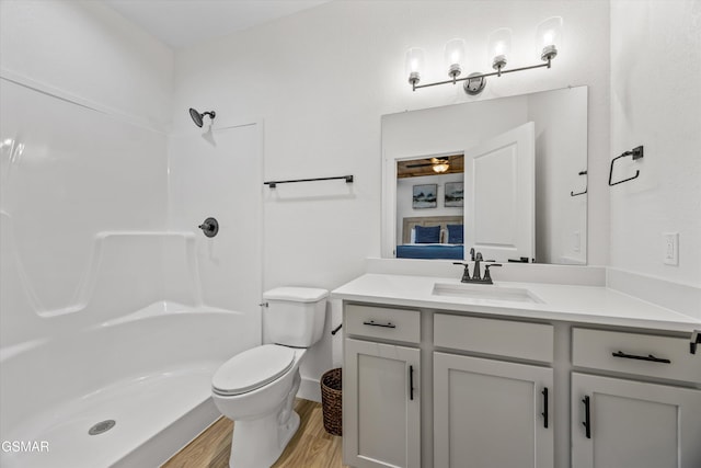 284 Laurel Oaks Way, Gatlinburg, TN 37738 - full bathroom featuring vanity, a shower, and wood finished floors