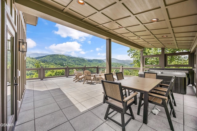 284 Laurel Oaks Way, Gatlinburg, TN 37738 - view of patio featuring a hot tub, a mountain view, and outdoor dining area