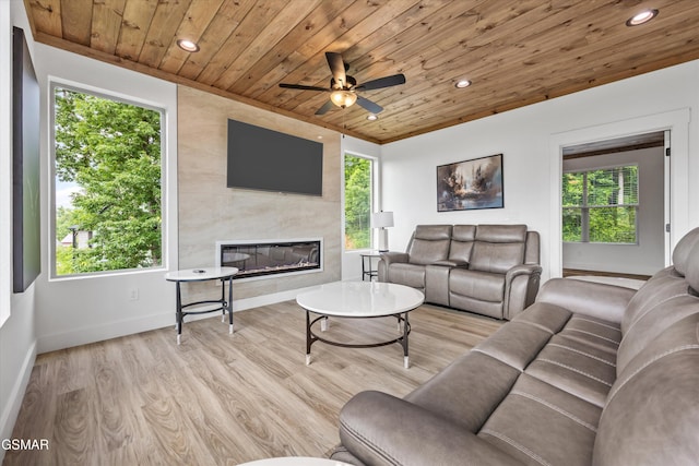 284 Laurel Oaks Way, Gatlinburg, TN 37738 - living area with wood ceiling, recessed lighting, a large fireplace, a ceiling fan, and wood finished floors
