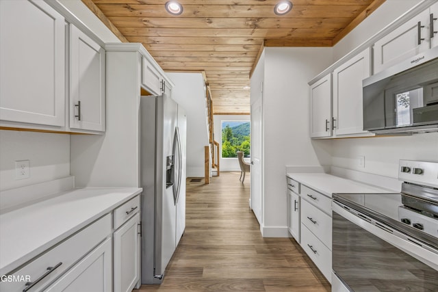 284 Laurel Oaks Way, Gatlinburg, TN 37738 - kitchen featuring stainless steel appliances, wood ceiling, light countertops, recessed lighting, and wood finished floors