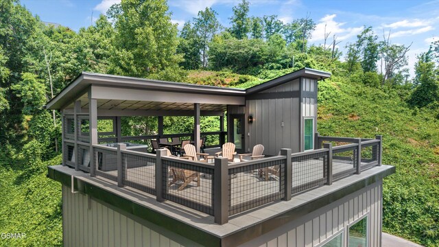 284 Laurel Oaks Way, Gatlinburg, TN 37738 - deck with a fire pit and a forest view