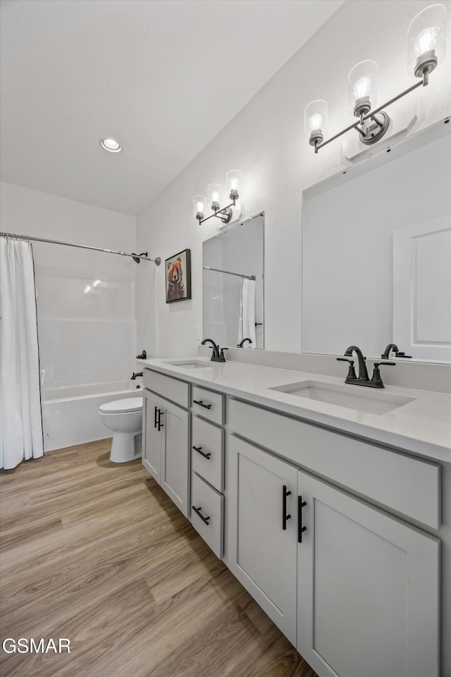 284 Laurel Oaks Way, Gatlinburg, TN 37738 - full bath featuring double vanity, shower / bathtub combination with curtain, wood finished floors, and recessed lighting