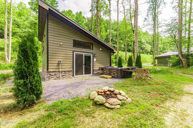 5145 E Parkway Pkwy, Cosby, TN 37722 - rear view of house with stone siding