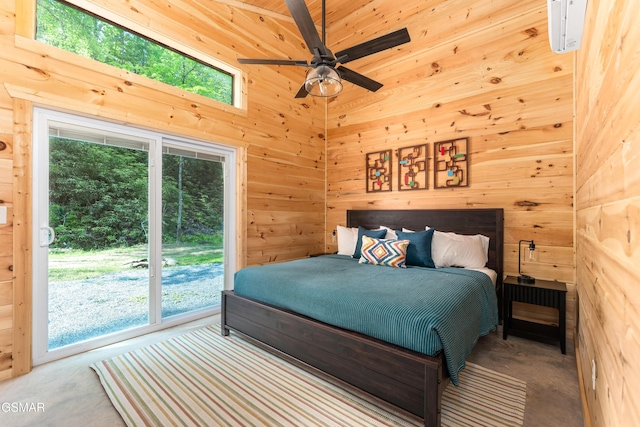5145 E Parkway Pkwy, Cosby, TN 37722 - bedroom featuring wood walls, multiple windows, and concrete floors