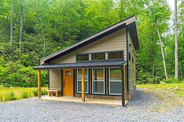 5145 E Parkway Pkwy, Cosby, TN 37722 - view of front of house featuring a view of trees and a metal roof