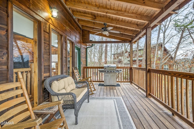 wooden deck with grilling area