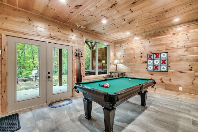 game room with wood walls, wood ceiling, pool table, and french doors