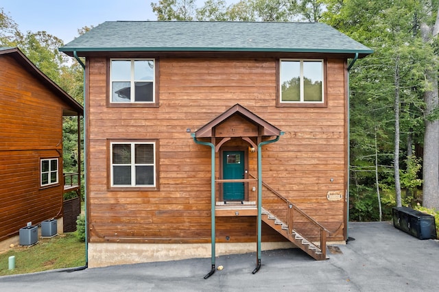 view of front of home featuring cooling unit