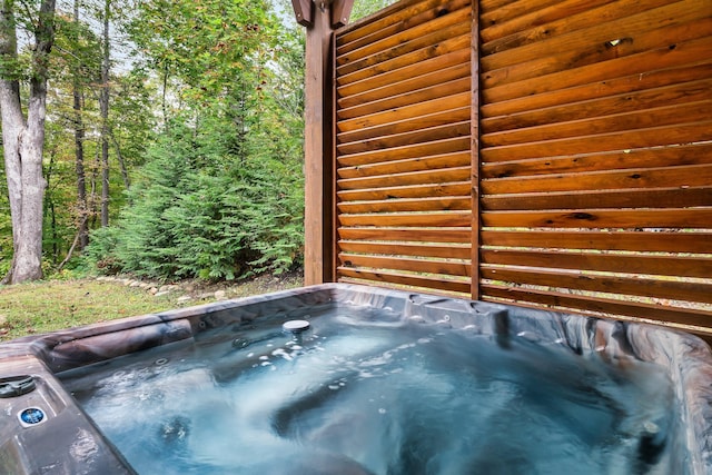 exterior space featuring a hot tub