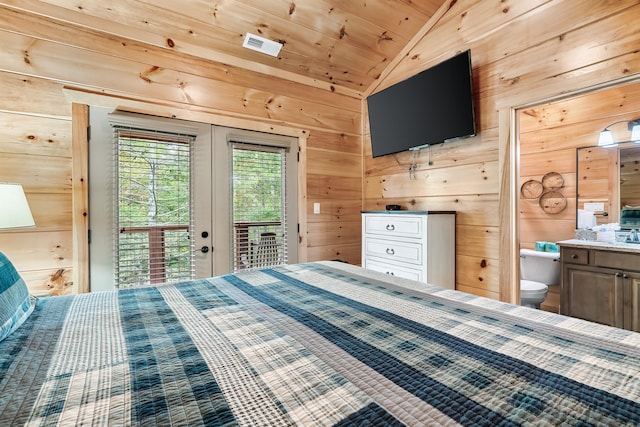 unfurnished bedroom featuring wood walls, lofted ceiling, ensuite bathroom, access to exterior, and wood ceiling