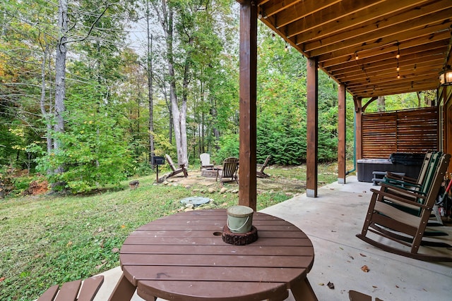 view of patio featuring an outdoor fire pit